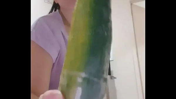 Big cucumber in the spit fresh Videos